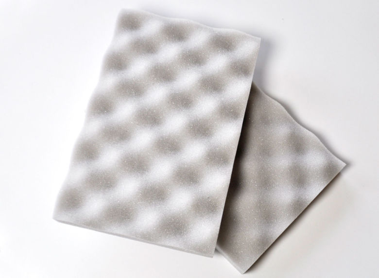 Light grey convoluted foam sheets.