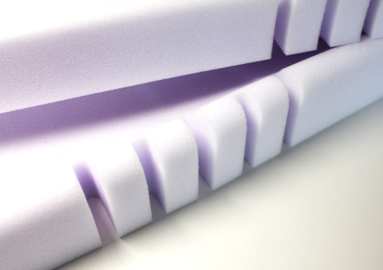 Violet Open Cell Foam with cut out slots for flexibility.